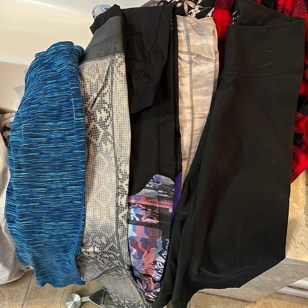 Nike and Reebok leggings, 1 pair is capri. Comes as a bundle